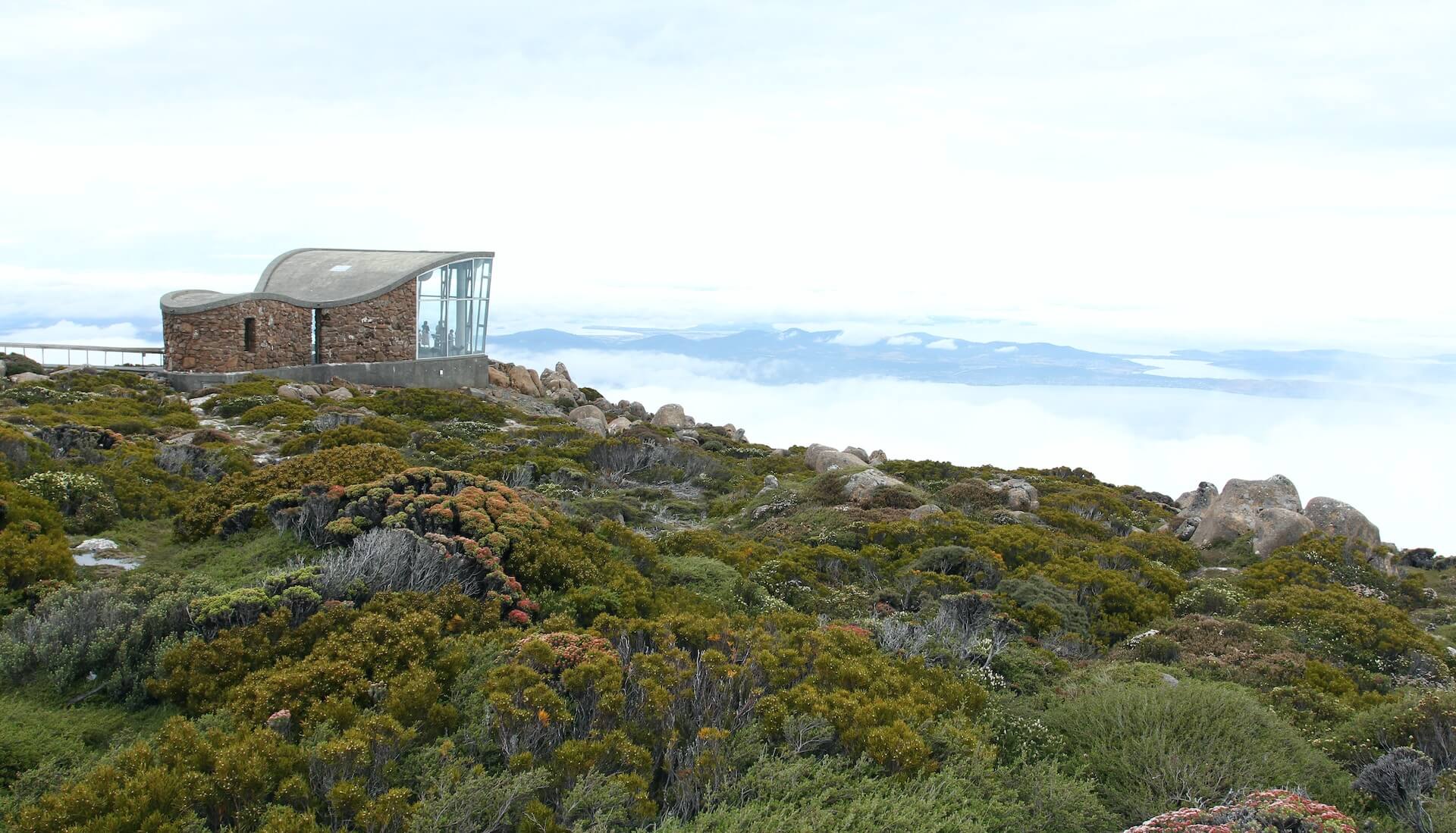 peak view of clouds and terrain in mount wellington